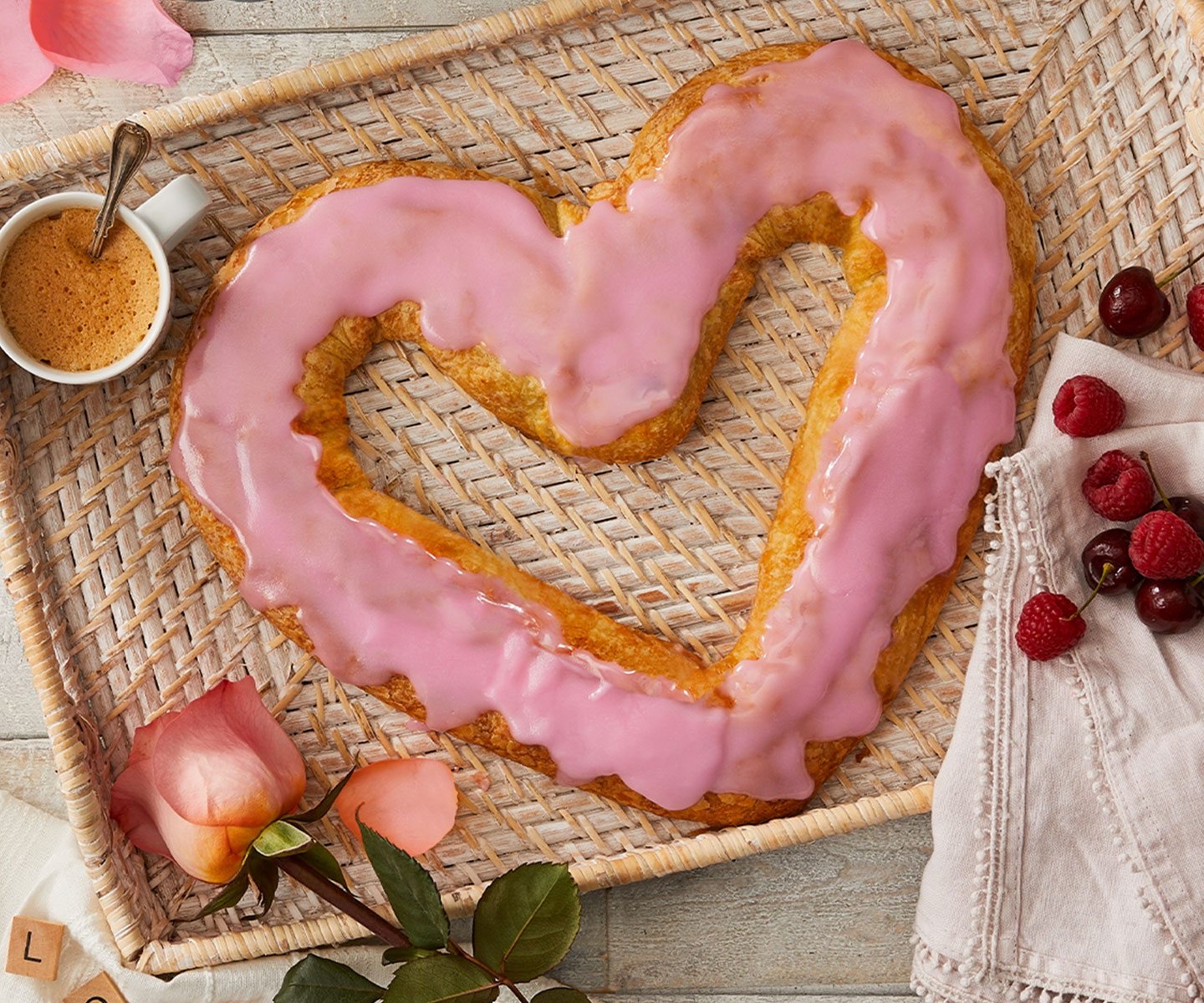 Heart-shaped, pink frosted Kringle