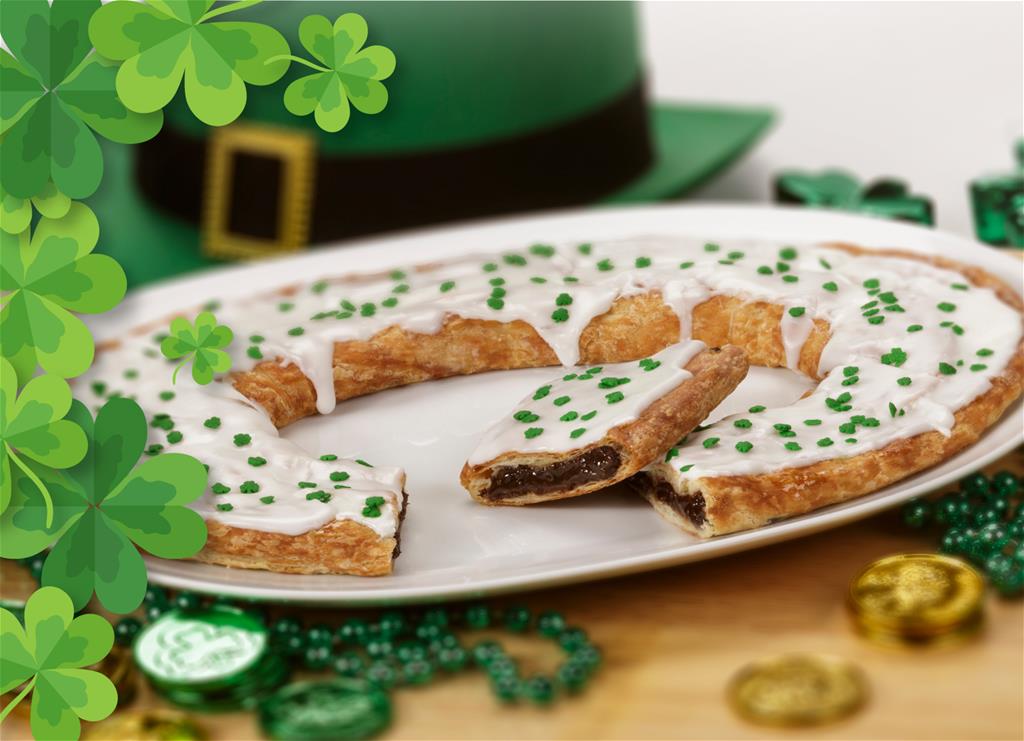 St. Patrick's Day Kringle surrounded by beads and coins. 