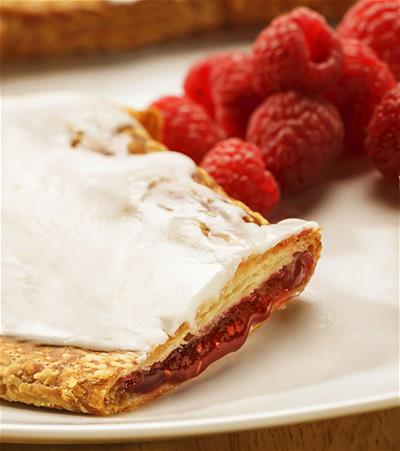 Our most popular fruit flavor! Baked in a buttery crust, our Raspberry Kringle has a filling of slightly tart, handpicked raspberries which perfectly complements the sweetness of our vanilla icing. A not too sweet, not too tart treat for anyone and everyone to enjoy!